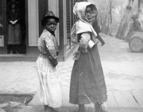 photograph of two slave children on city street